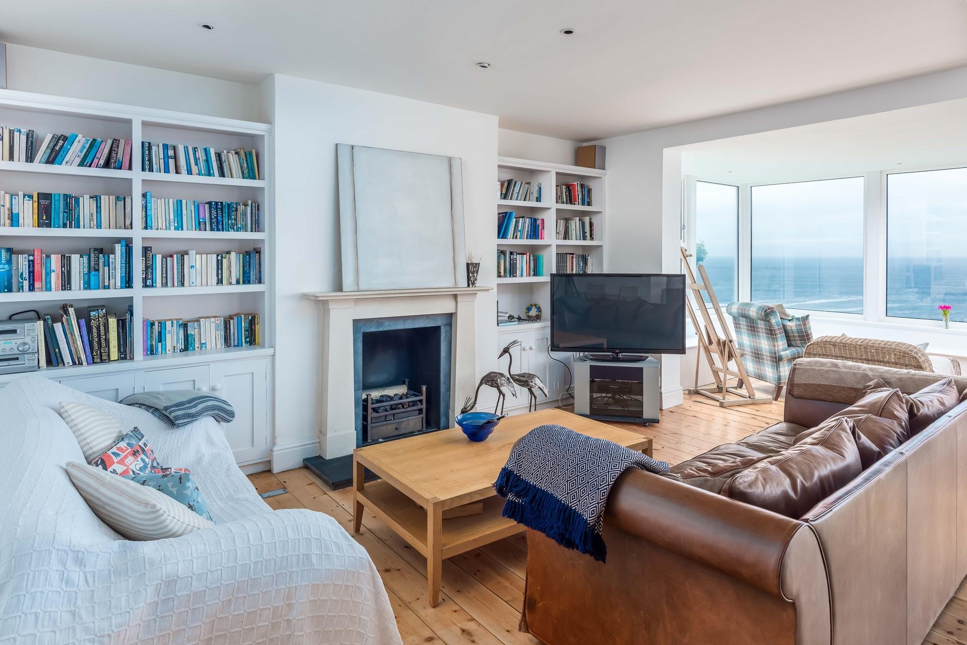 Sit in the comfortable sitting room and enjoy the views.