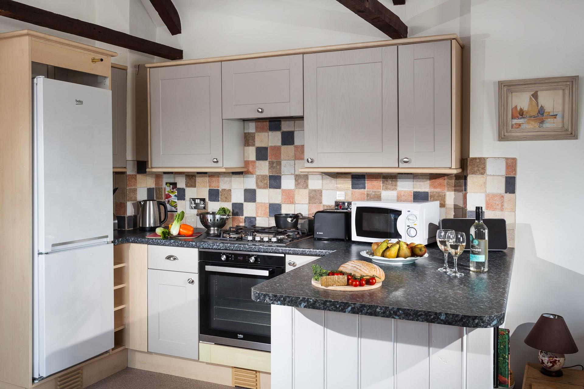 The well-equipped kitchen makes cooking a breeze.