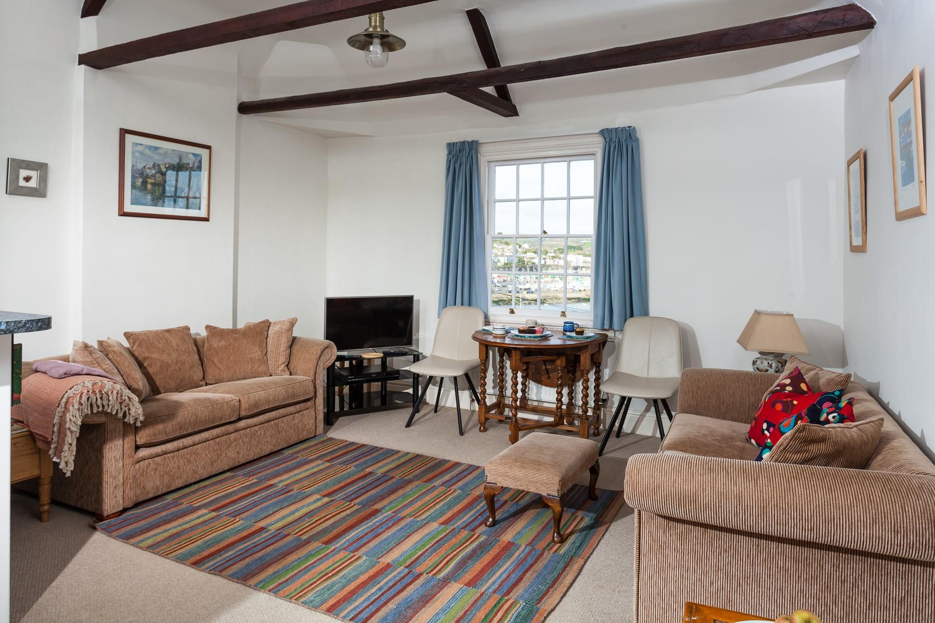 Relax in your sitting room looking out at Penzance harbour.