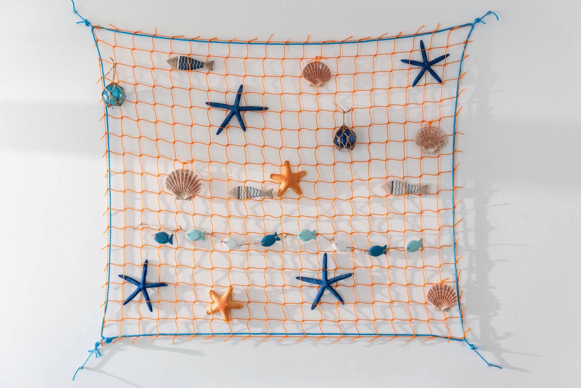 The fun and quirky coastal decor reminds you just how close to the sea you are!