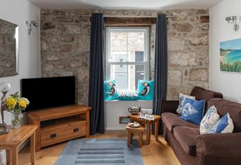 Come back from a day on the beach to unwind in the comfortable sitting room.