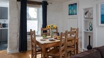Tuck into a tasty feast around the table as a family.