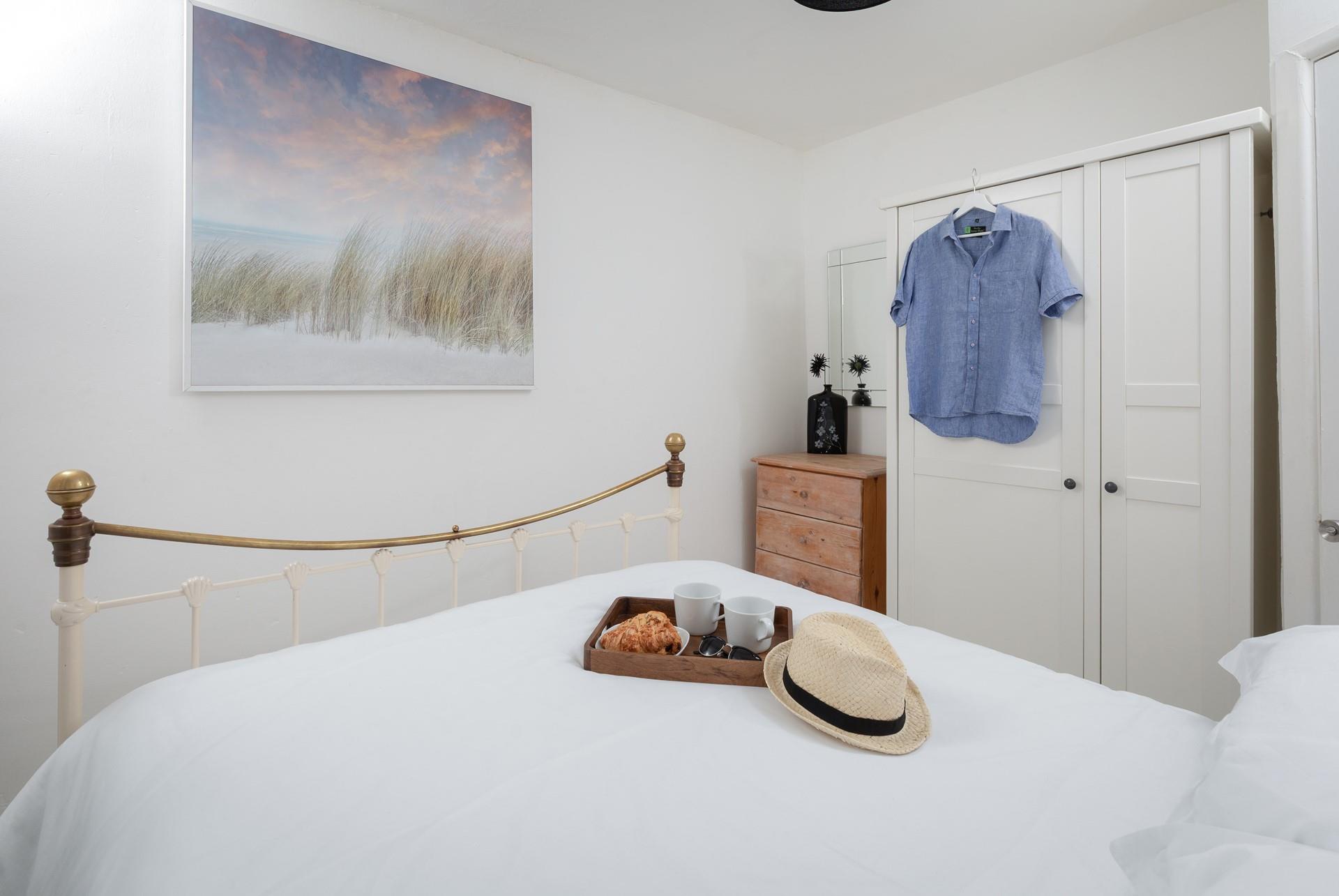 The bedrooms are decorated with calming tones.