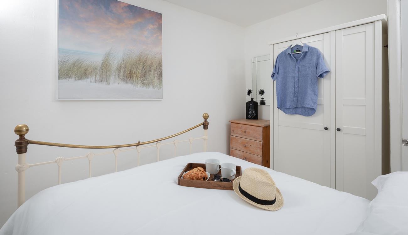 The bedrooms are decorated with calming tones.