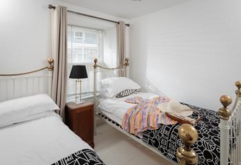 Victorian style metal bedstead twin beds are perfect for adults or children.