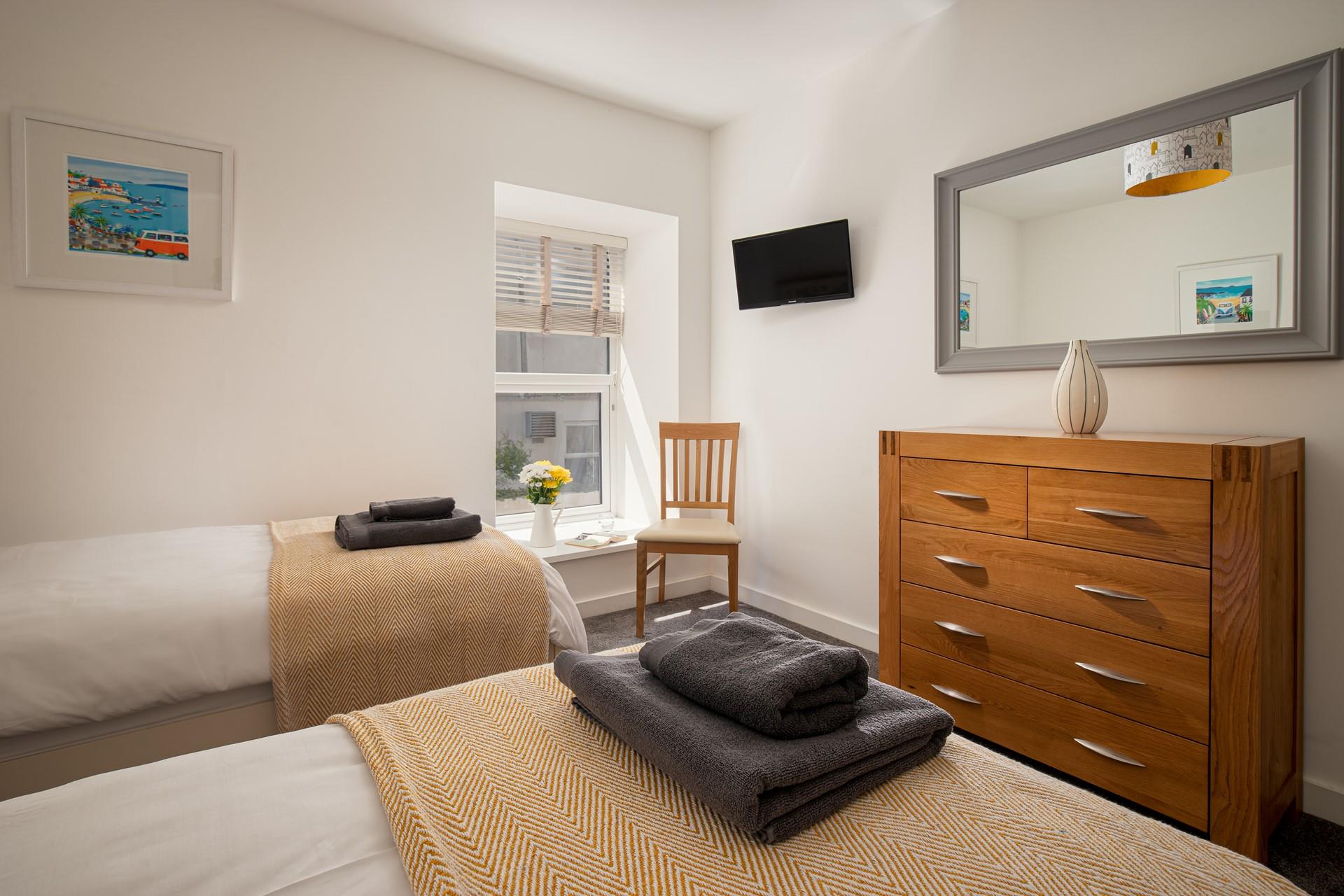 A TV in the bedroom will keep children entertained on those relaxed mornings.