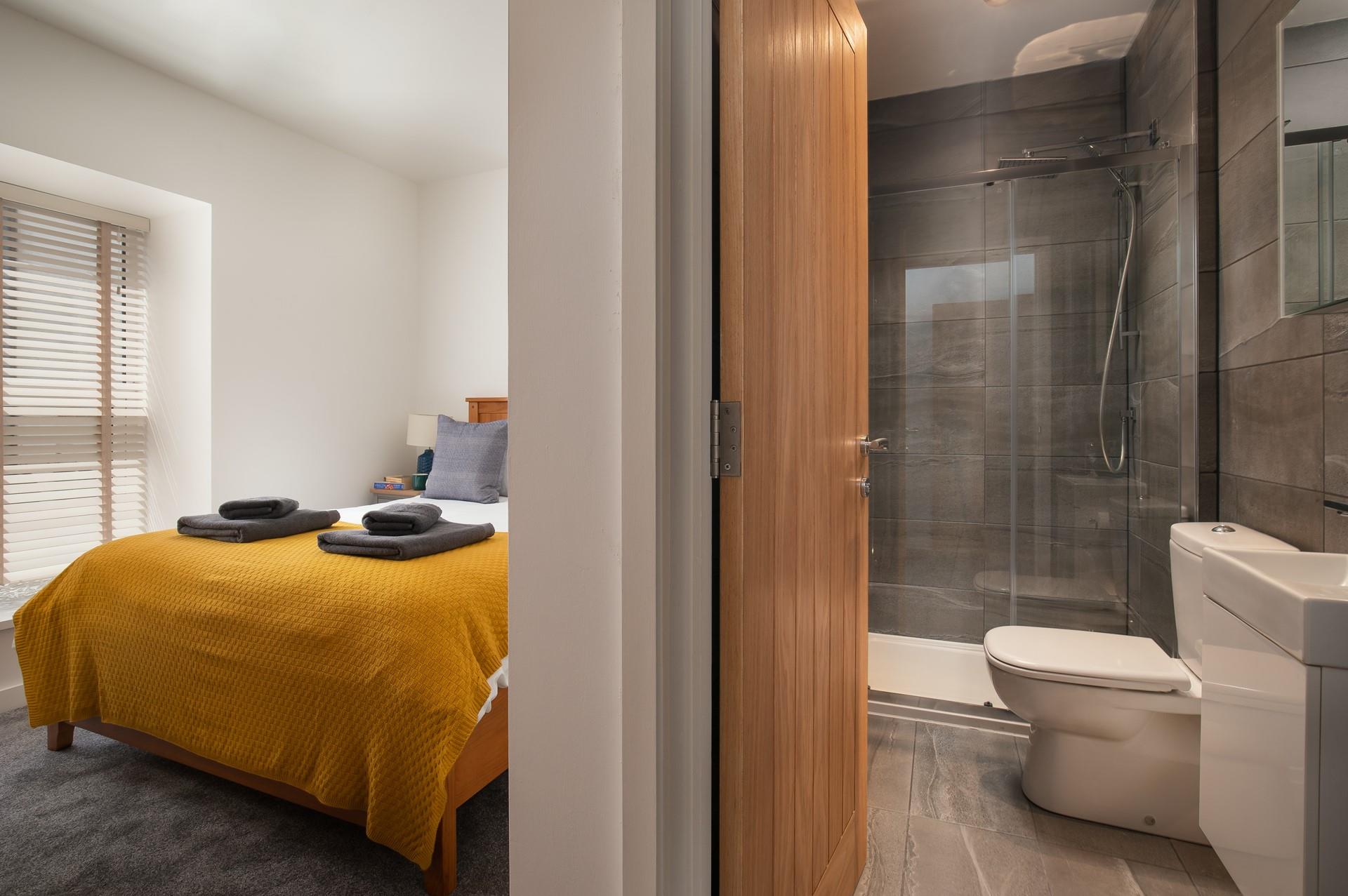 The en suite shower room has been beautifully designed and has a luxurious feel.