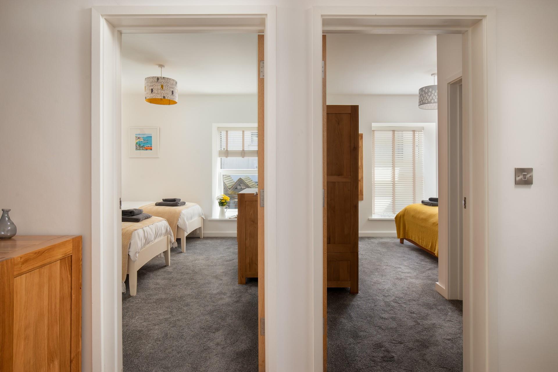 Both bedrooms are accessed via the hallway.