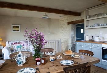 The homely cottage-style kitchen and dining area are a dream to cook and eat in.