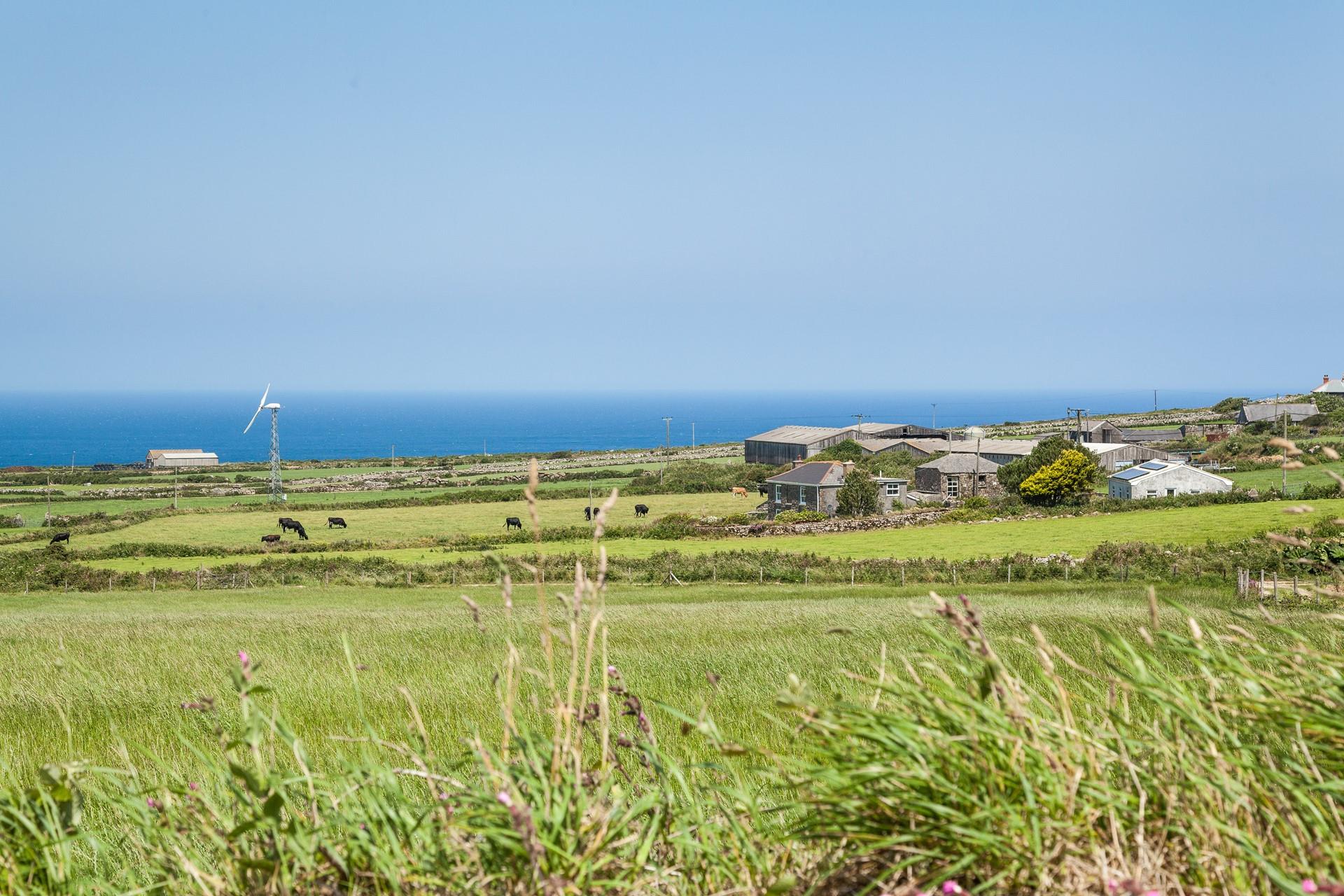 The farmhouse has stunning views of the Cornish countryside looking out to the coast.