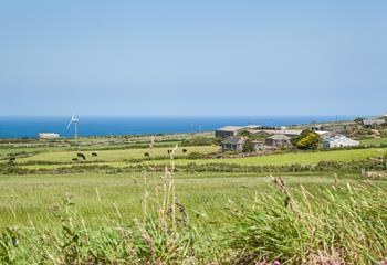 The farmhouse has stunning views of the Cornish countryside looking out to the coast.