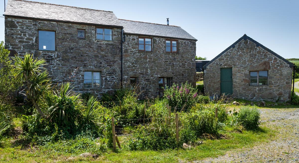 The front of the farmhouse has ample parking for your stay.