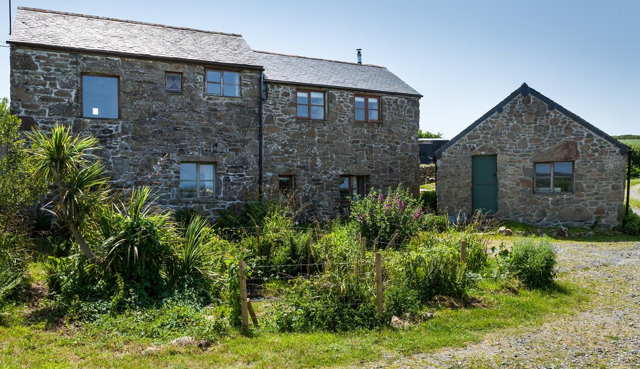 The front of the farmhouse has ample parking for your stay.