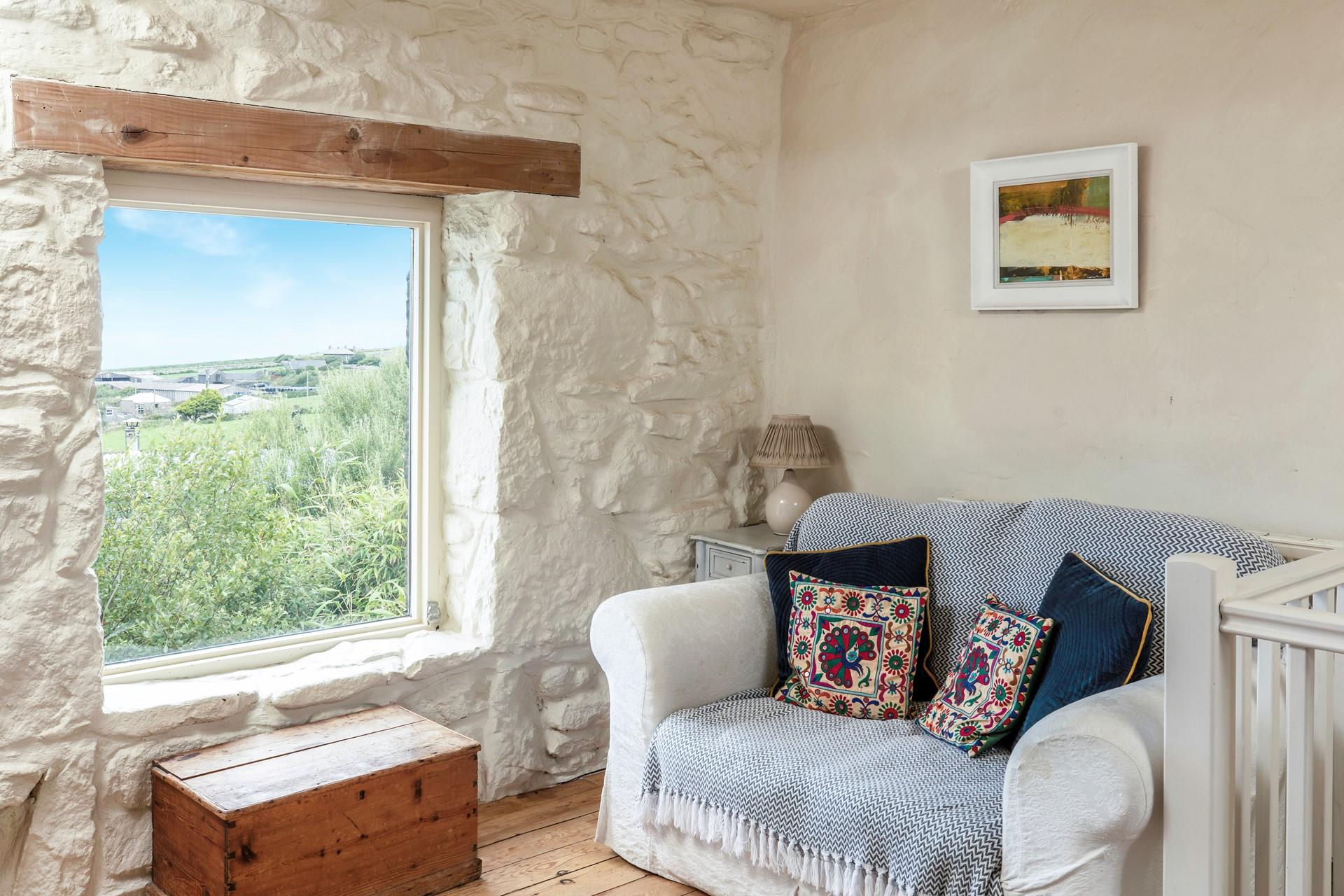 From this cosy corner, you can see "The Shepherd Hut at Bluebell Down Farm" - an additional bolthole for two! 