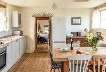 The homely cottage-style kitchen and dining area are a dream to cook and eat in.