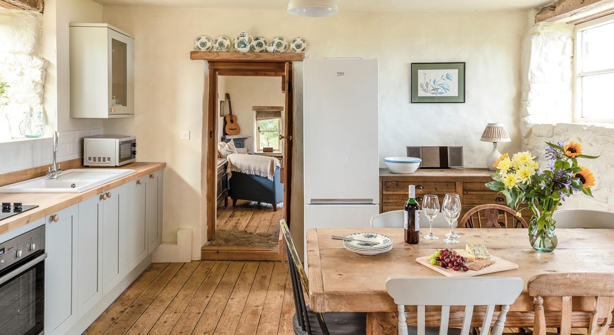 The homely cottage-style kitchen and dining area are a dream to cook and eat in.