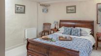 This comfy king size bed enables you to completely relax and sleep soundly.