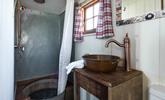 The shower room adds to the quirky and rustic finish - the shower tray is made from an old tin bath! - Thumbnail Image