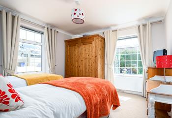 Dual aspect windows allow plenty of light to fill the twin bedroom. 