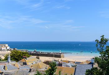 The iconic St Ives Harbour can be seen in the distance. 