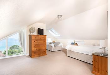 Bedroom 3 has twin beds and a fantastic sea view to wake up to each day.