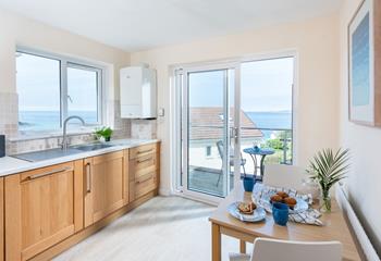 Prepare a meal in the kitchen with beautiful views.