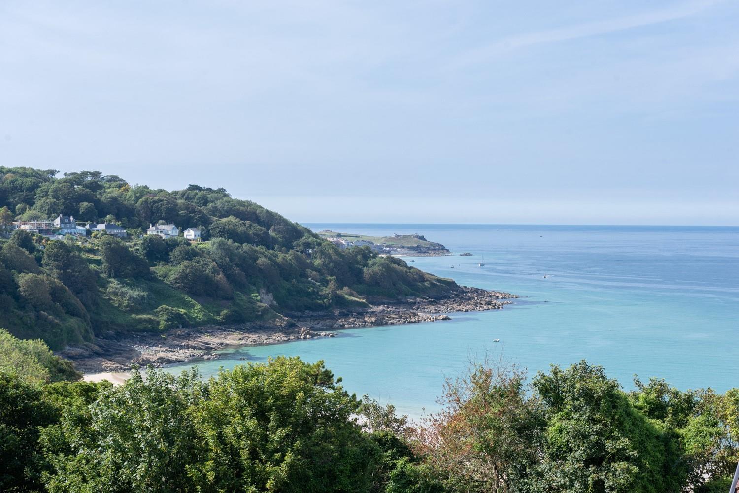 Stroll down to the tropical waters of Carbis Bay beach on a summer morning.