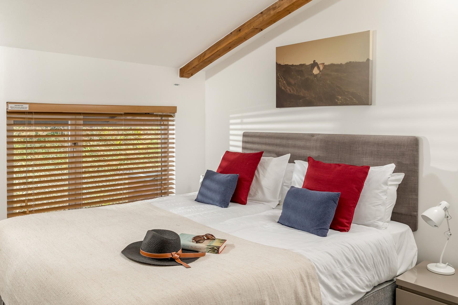 Muted neutral tones combined with the quiet location create a soothing atmosphere, perfect for drifting off to sleep.