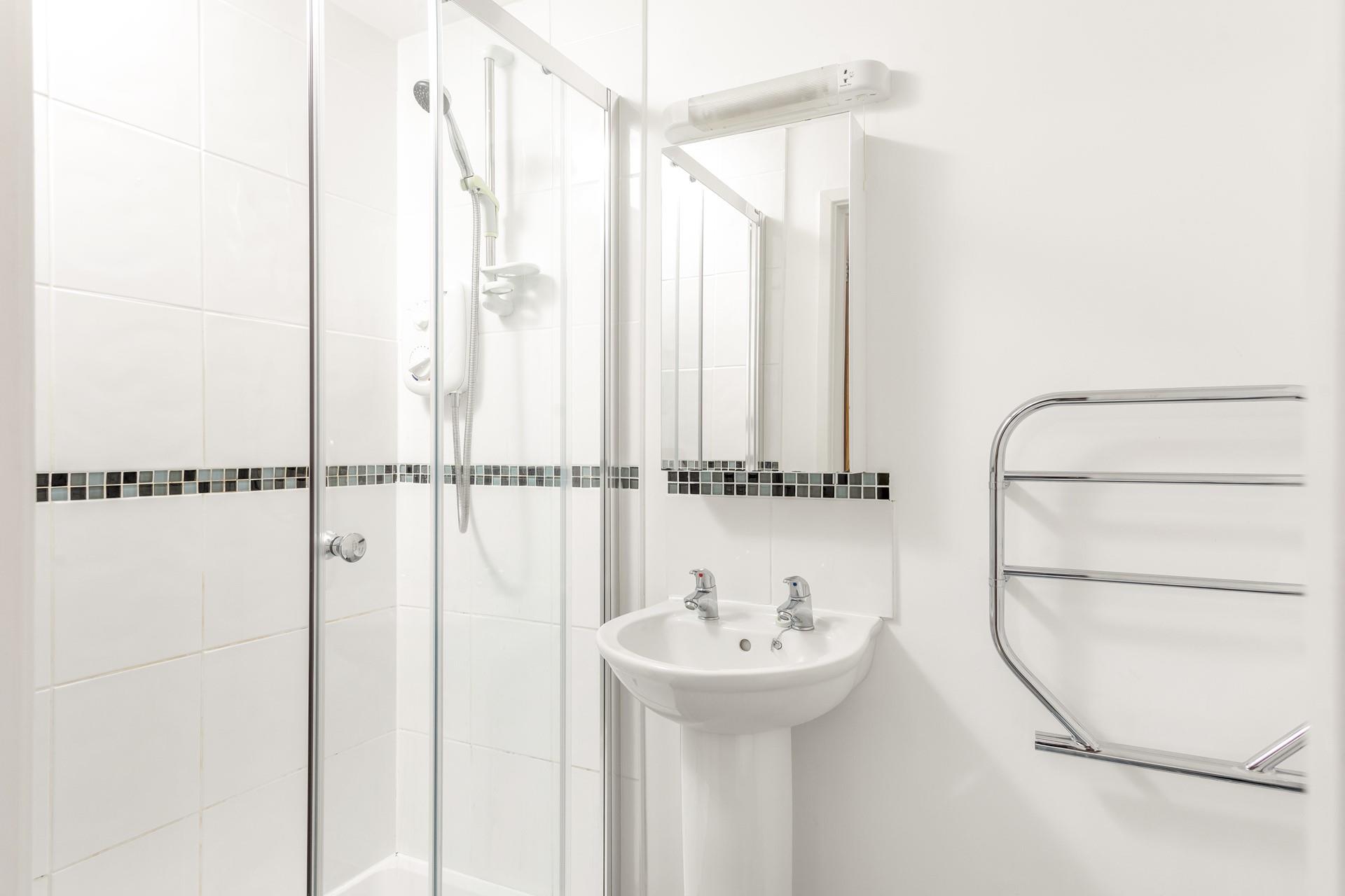 The en suite allows for additional room and privacy to get ready in the morning or before a night out.