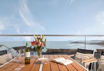 Enjoy a spot of al fresco dining on your balcony.