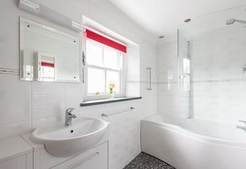 Bright and contemporary, you have the luxury of a bath and shower on your holiday here. 