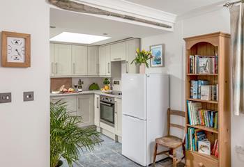 Filled with light, the kitchen is an enjoyable space to prepare a picnic for the day. 