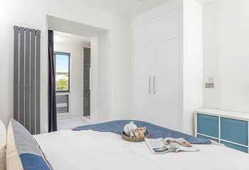 Climb out of bed and get ready for the day in the handy en suite.