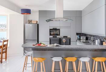 Sea views can be enjoyed from the kitchen and dining area.