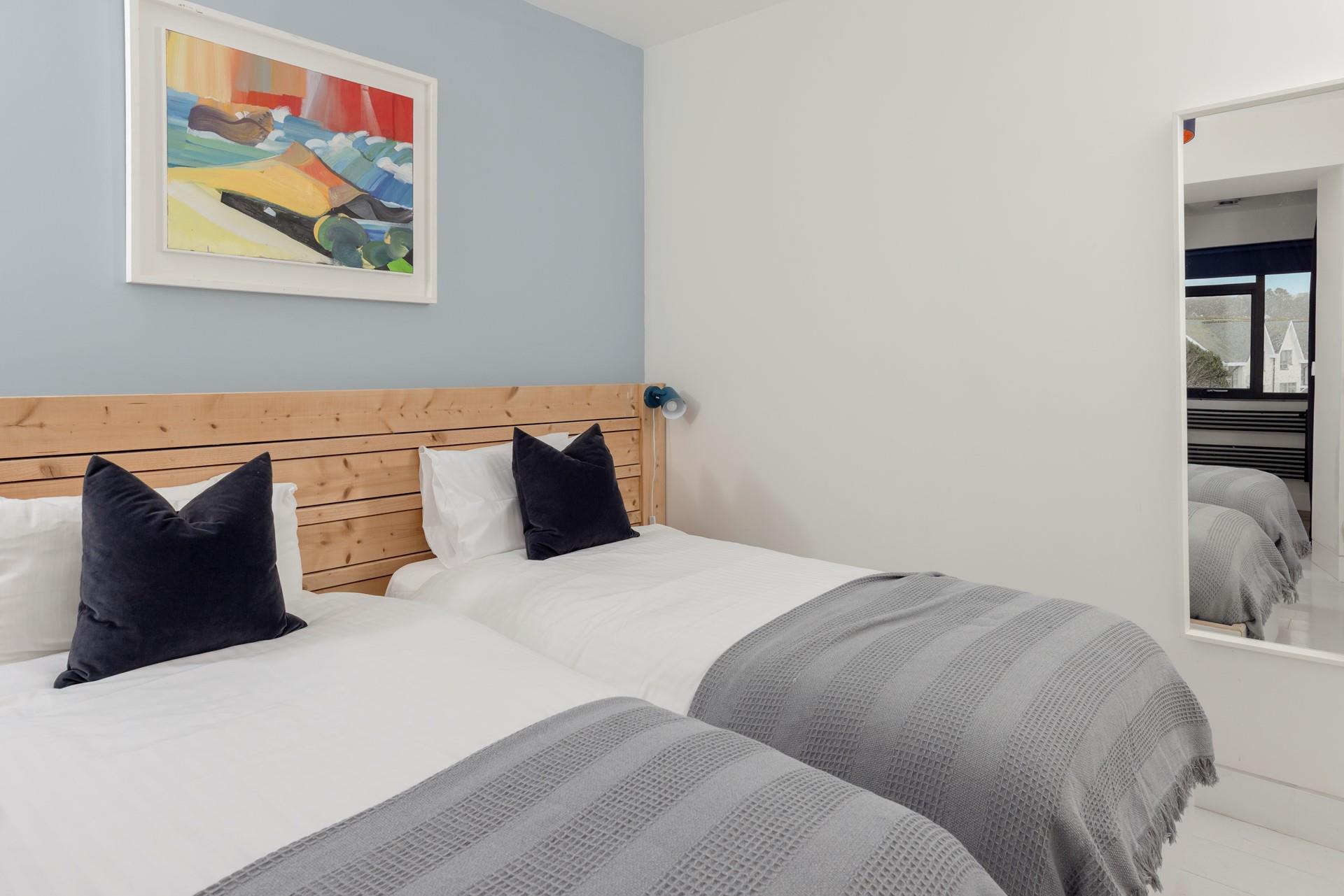 Twin beds allow for flexible sleeping arrangements.