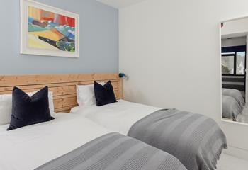 Twin beds allow for flexible sleeping arrangements.