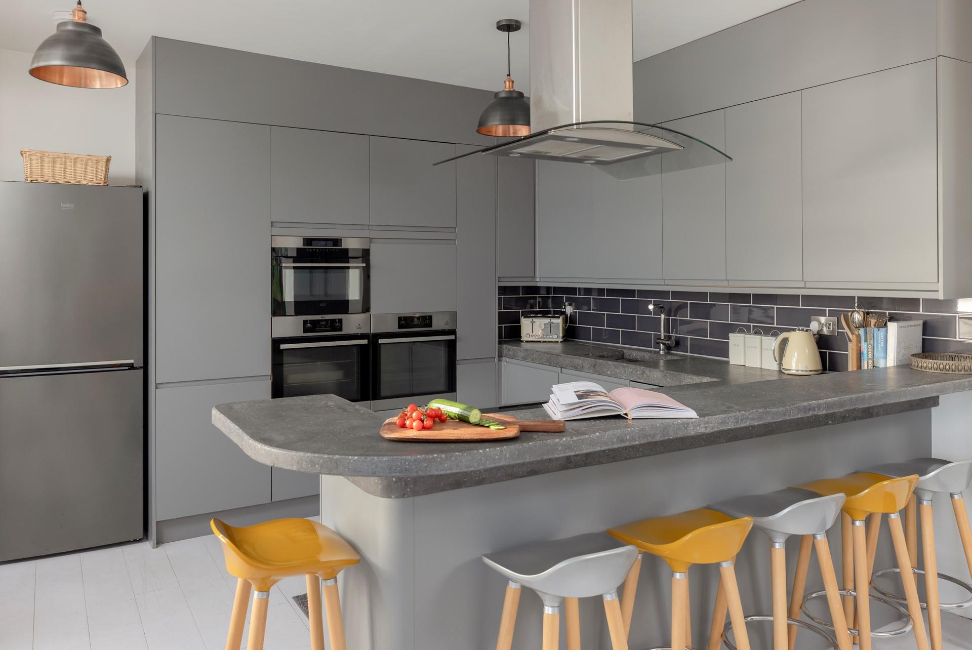 Gather together around the kitchen island as the family chef cooks up a storm!