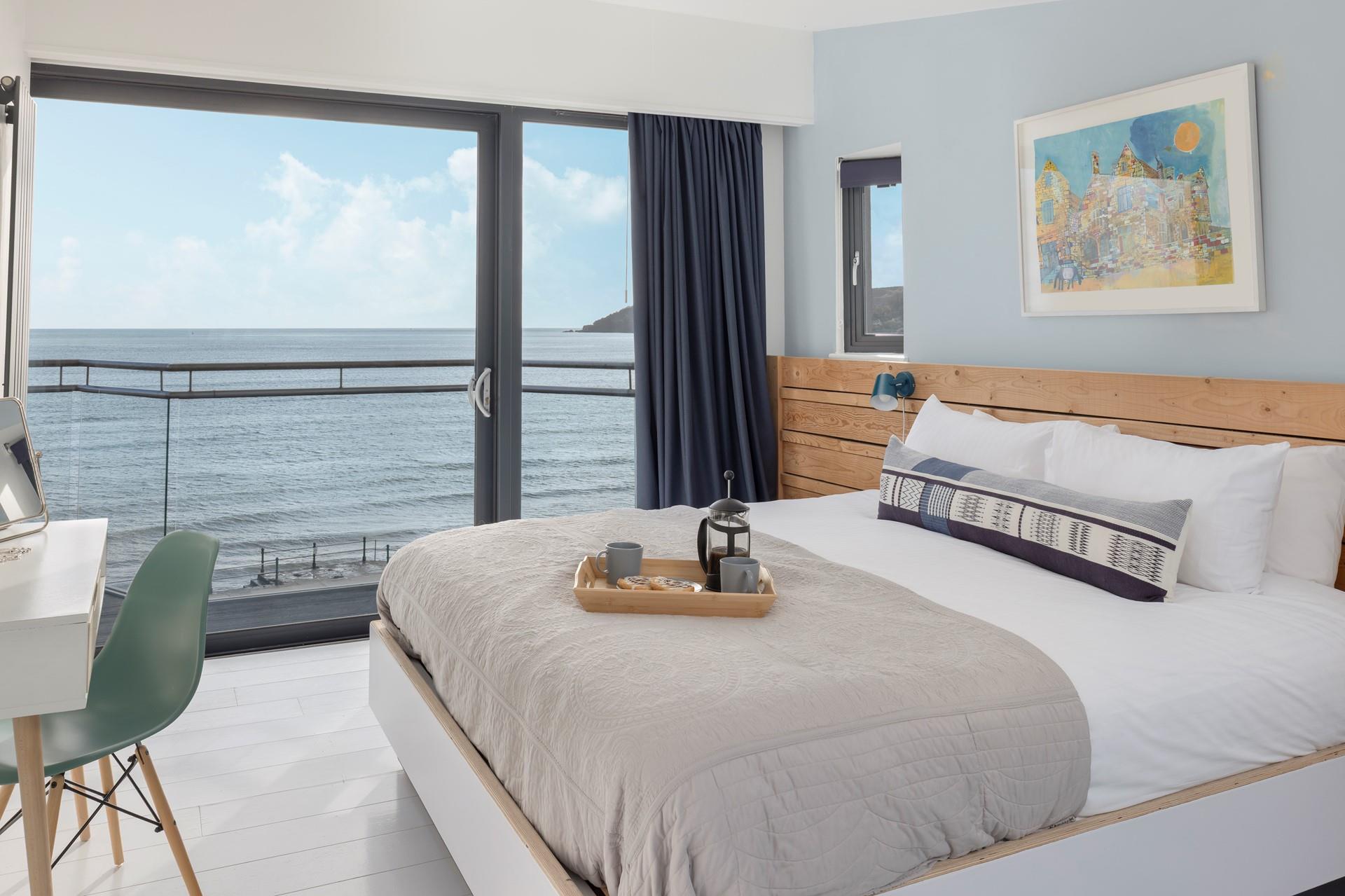 Wake up in the luxurious super king size bed to sea views while you sip a morning coffee.