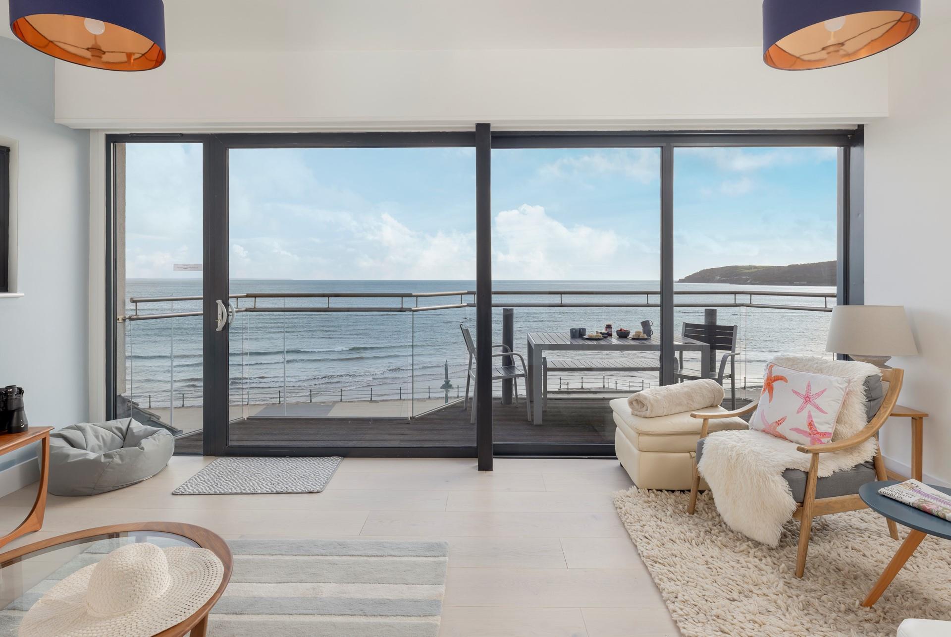 Open the balcony doors to let the sea air in as you admire the view!