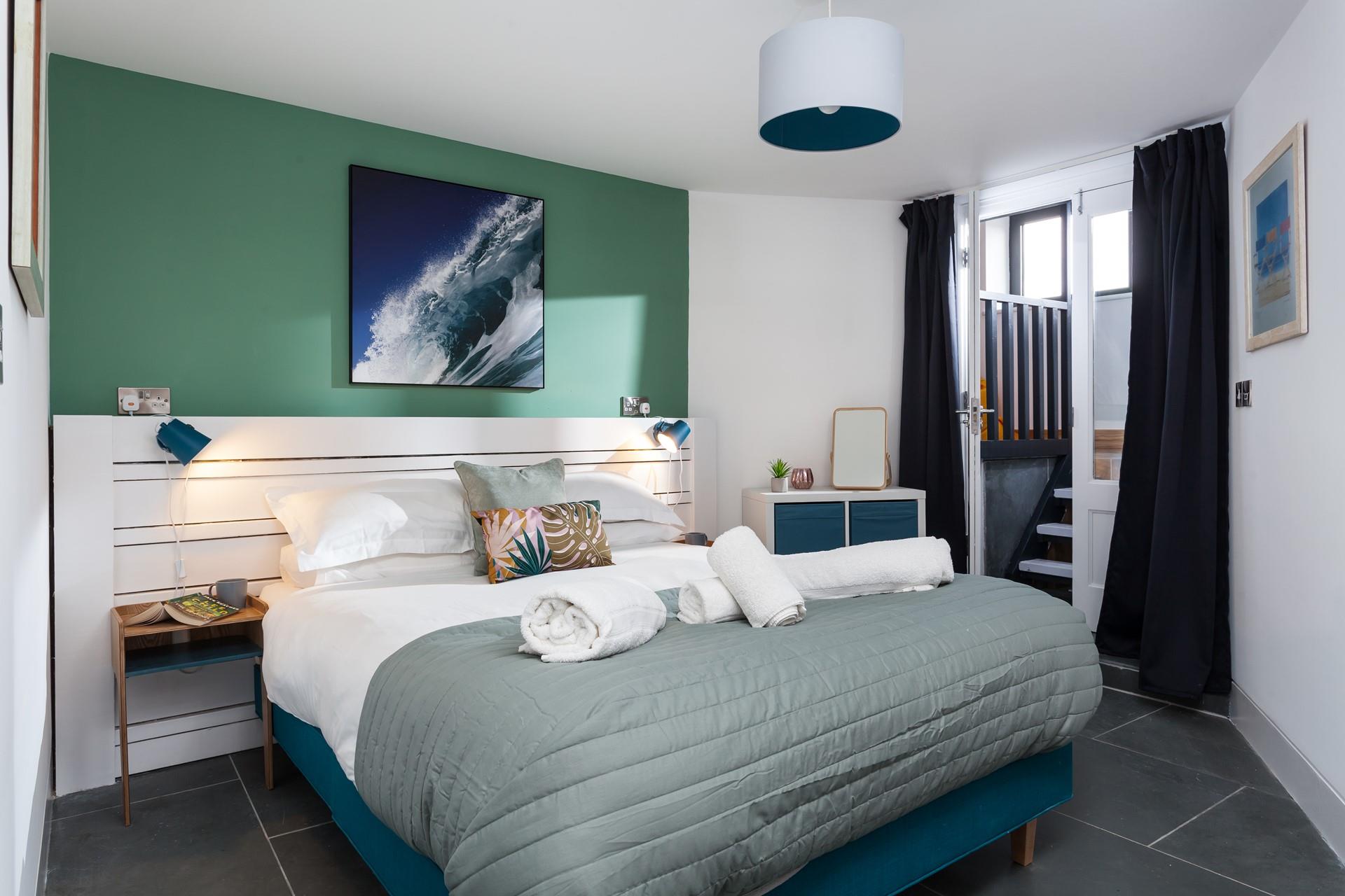 The king size bed provides a relaxing night's sleep after busy beach days.