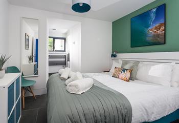 Cornwall-inspired artwork features on the walls of each bedroom.