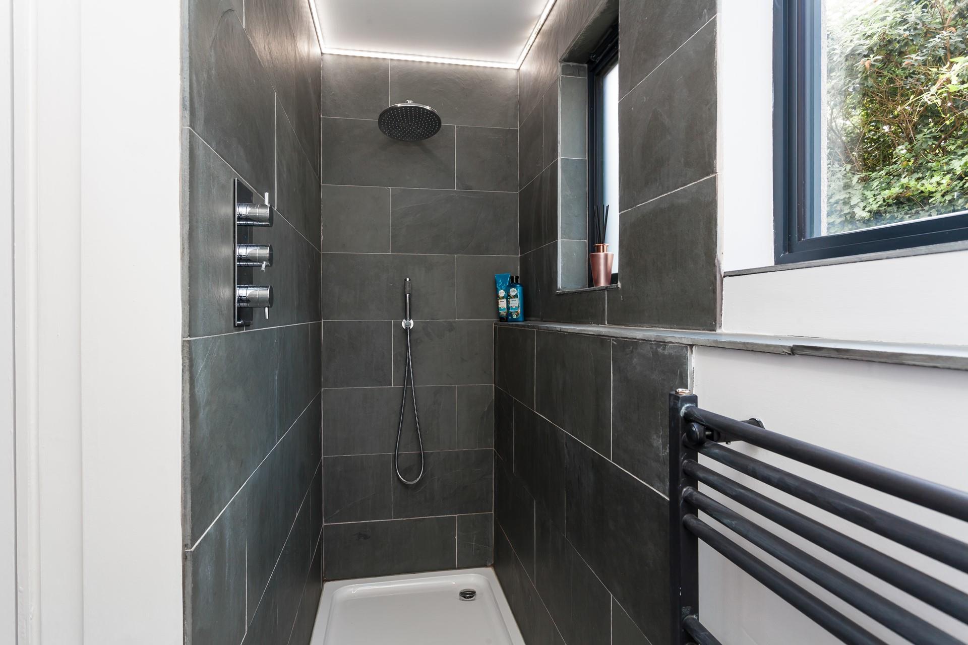After a day on the beach wash off your sandy toes in the rainfall shower.
