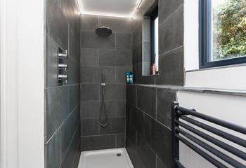 After a day on the beach wash off your sandy toes in the rainfall shower.
