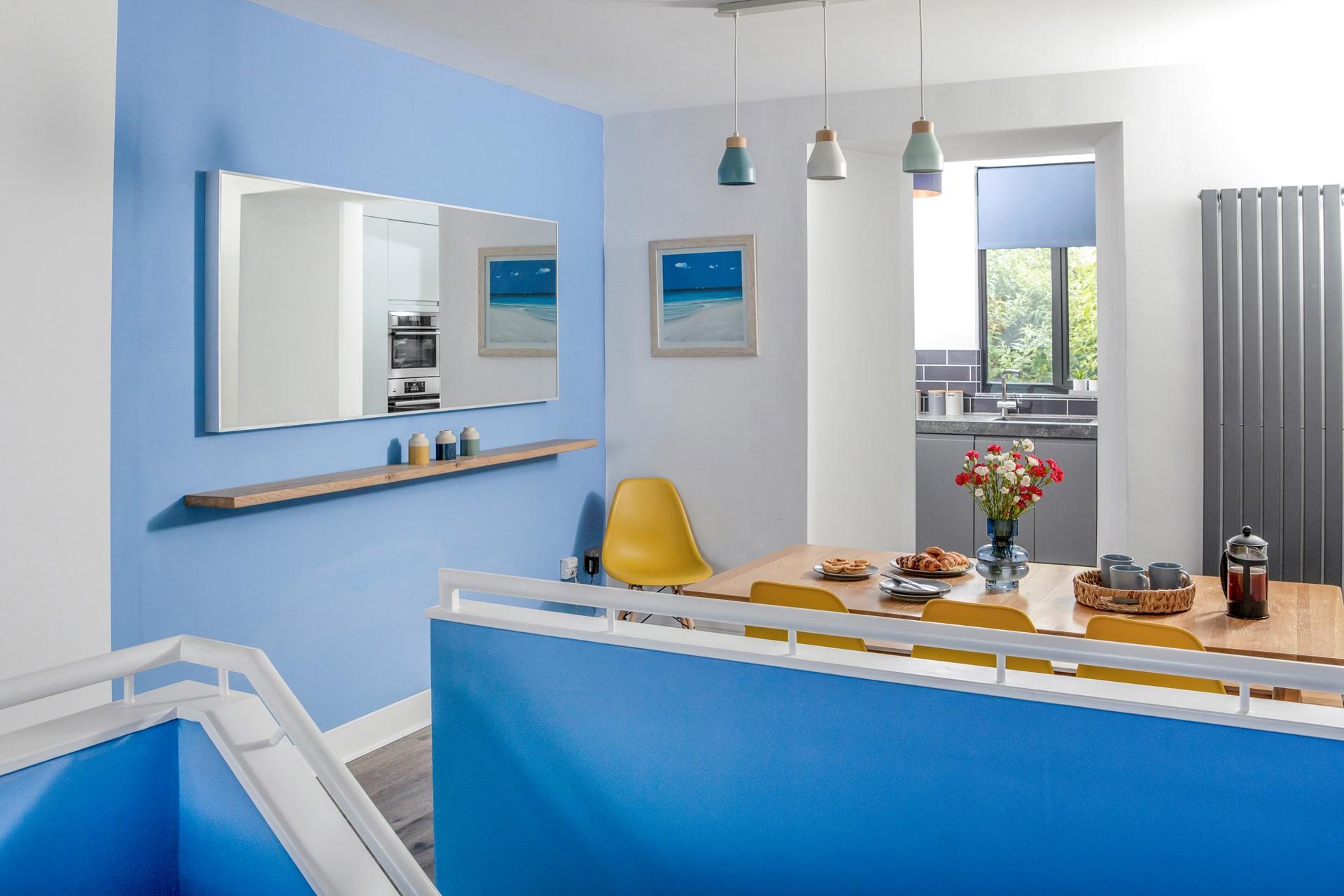 Sit around the dining table and tuck into tasty meals that have been bought locally.