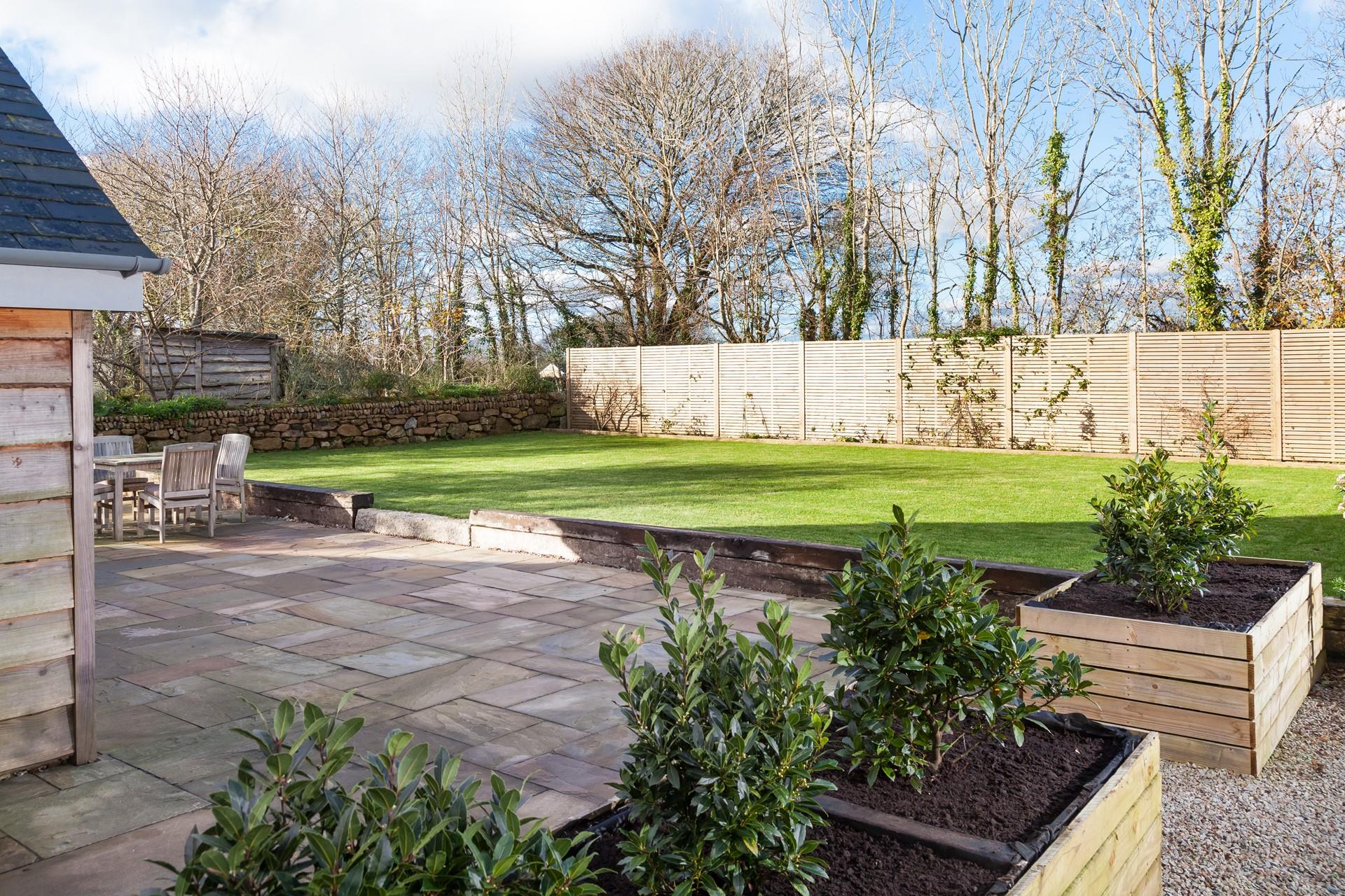 The Garden Barn boasts a beautifully spacious garden, ideal for all the family.