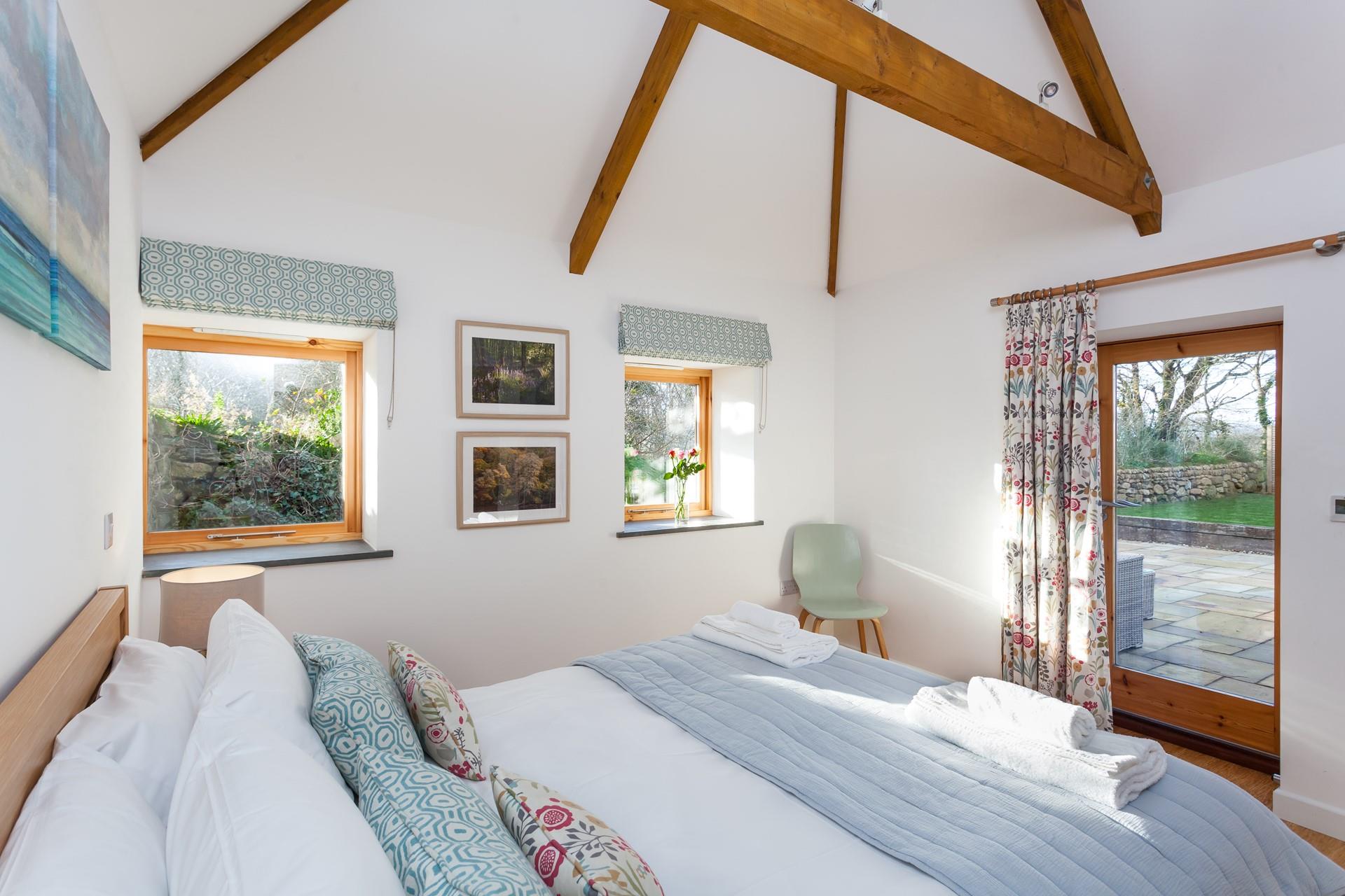 Step from the bedroom onto the sunny patio.