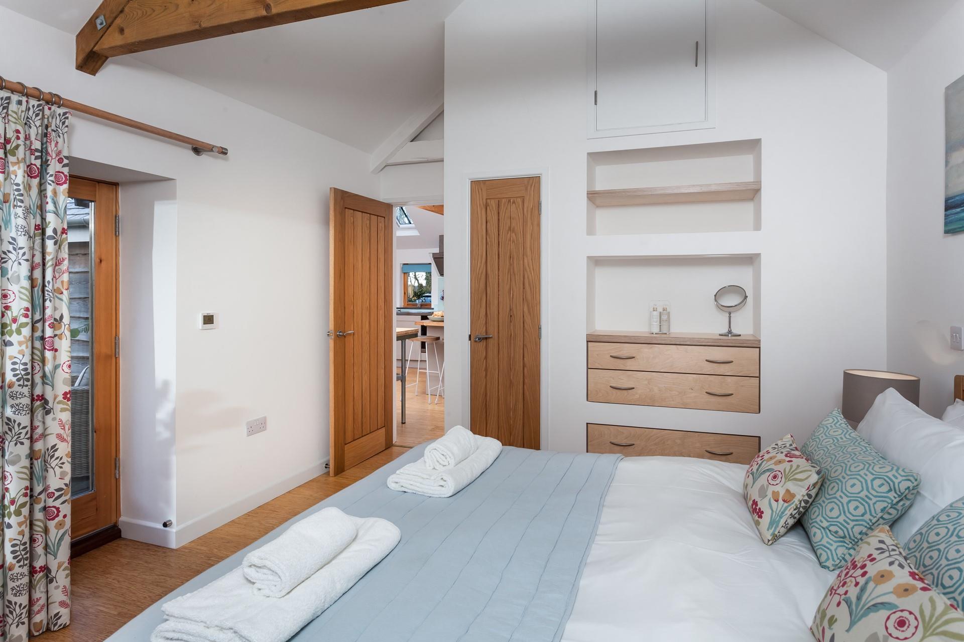 The spacious bedroom makes getting ready for the day easy.