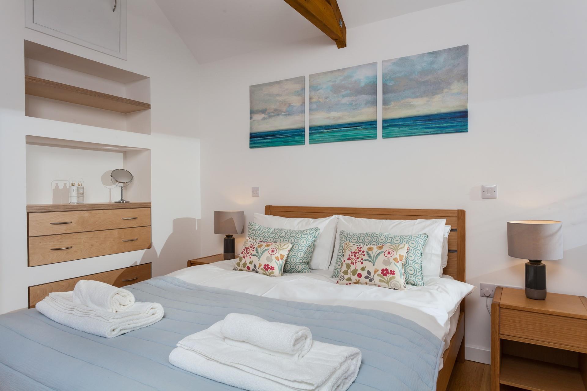 The king size bed is a welcome retreat.