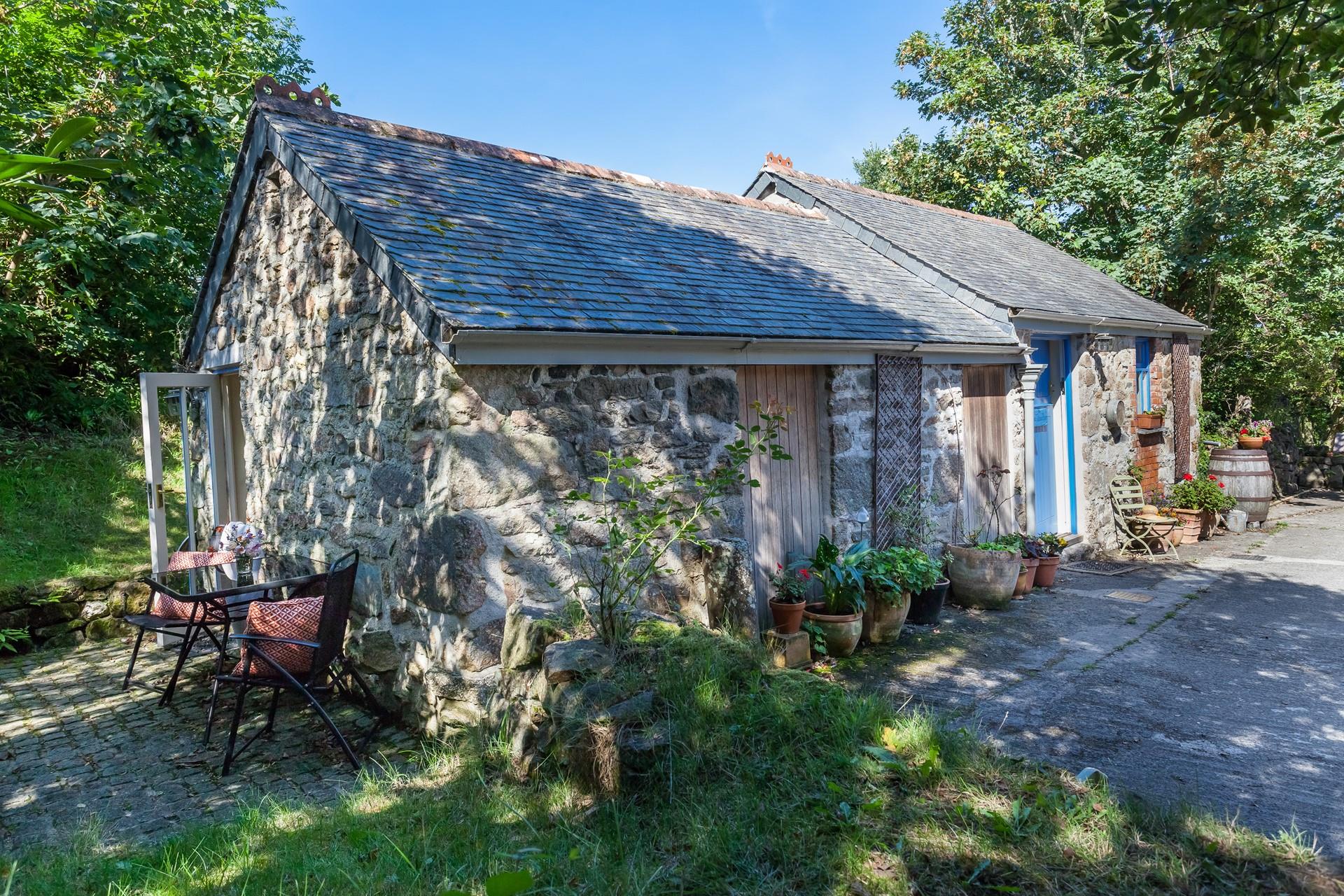 The peaceful patio is the perfect spot for a morning cup of tea.