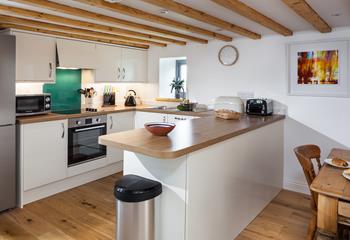 Exposed beams retain the traditional feel of the property.